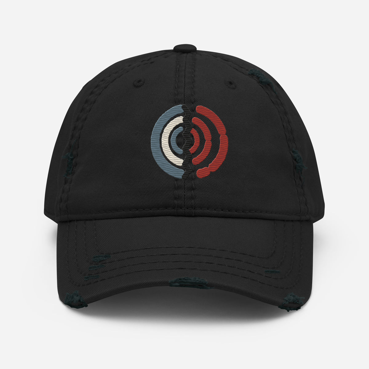 Close front view of Witness Broadcast Scar embroidery in blue, cream and rust-red on a black distressed dad hat.